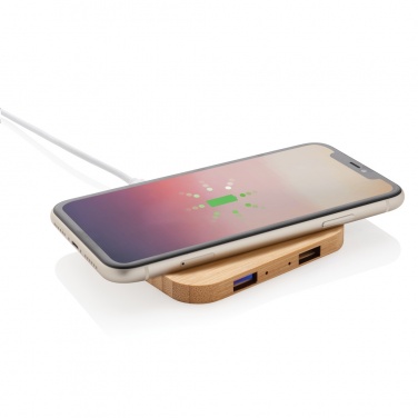 Logotrade werbemittel das Foto: 5W-Wireless-Charger aus Bambus mit USB