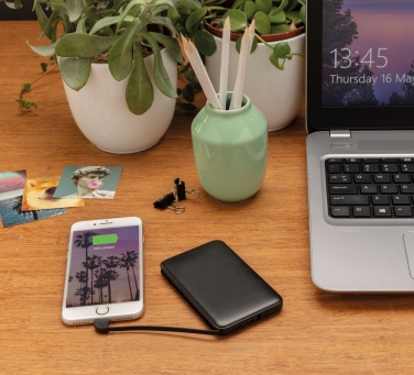 Logo trade promotional giveaways image of: 5.000 mAh Pocket Powerbank with integrated cables